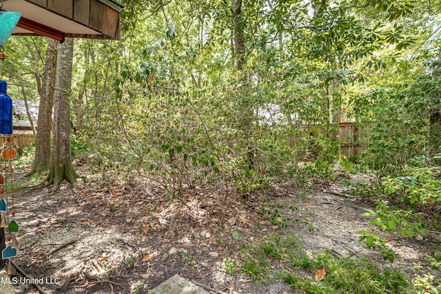 view of yard featuring fence