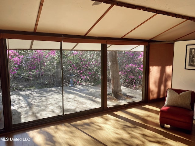 unfurnished sunroom with plenty of natural light
