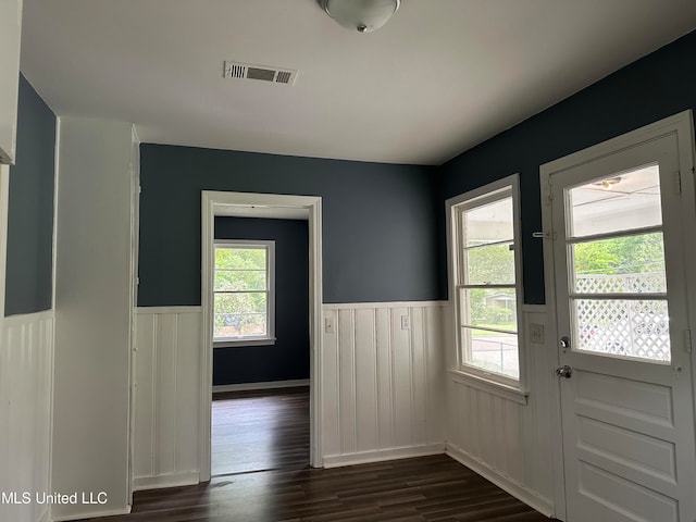 doorway to outside featuring dark hardwood / wood-style floors