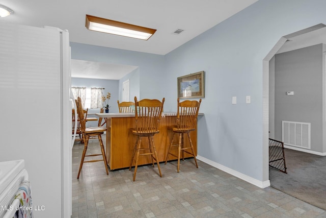 dining room with bar area