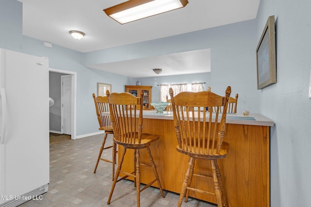 dining room featuring bar