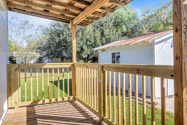 deck featuring a yard