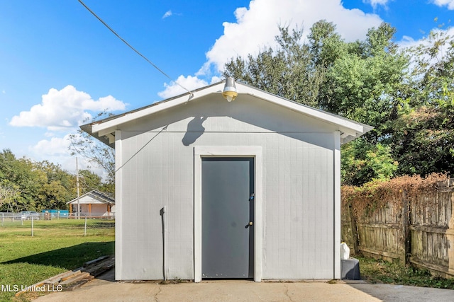 view of outdoor structure featuring a yard