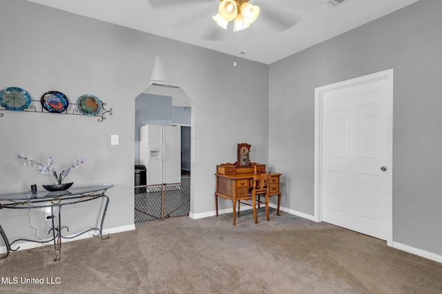 interior space featuring ceiling fan