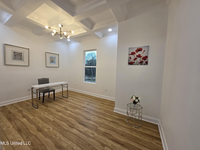 home office with baseboards, a chandelier, coffered ceiling, beamed ceiling, and wood finished floors
