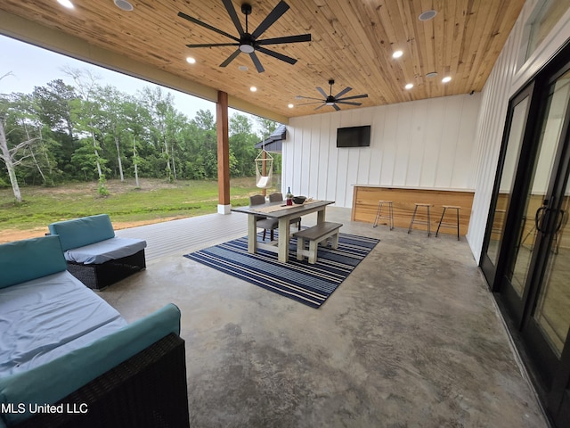 view of patio / terrace featuring outdoor dining area, outdoor lounge area, and ceiling fan