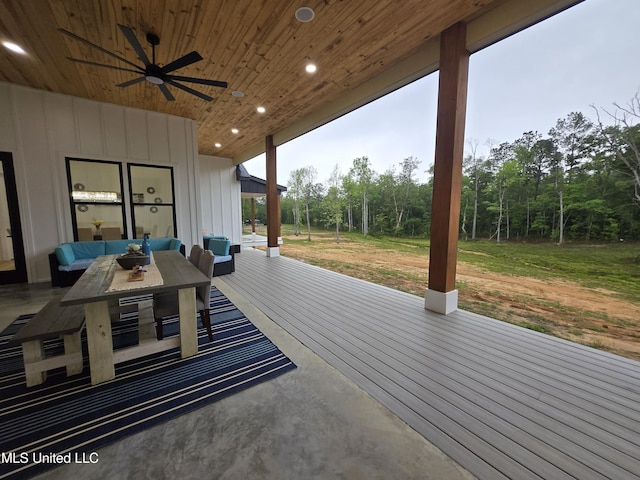 view of patio with a ceiling fan and outdoor dining space