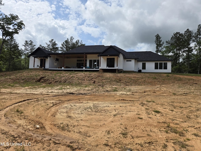 single story home with board and batten siding