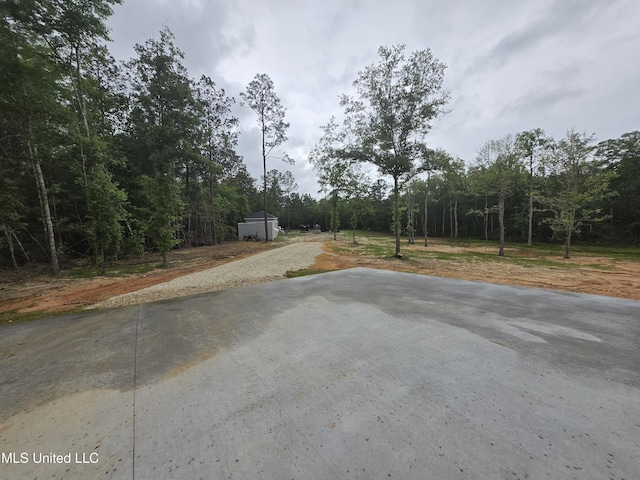 view of road featuring a view of trees