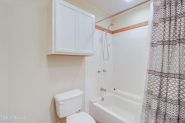 bathroom featuring crown molding, shower / bath combination with curtain, and toilet