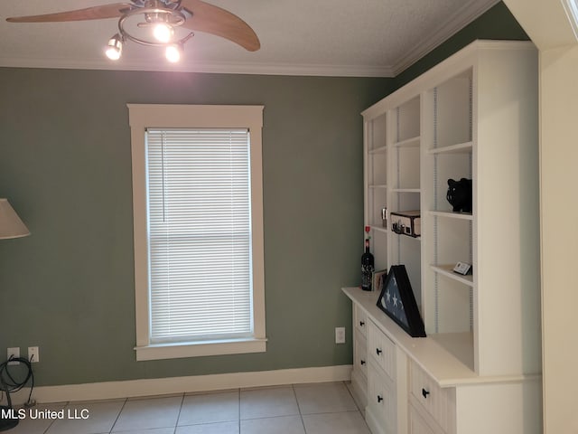 mudroom with light tile patterned flooring, ceiling fan, and ornamental molding