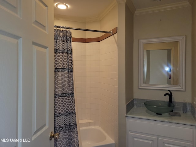 bathroom with crown molding, vanity, and shower / bath combo