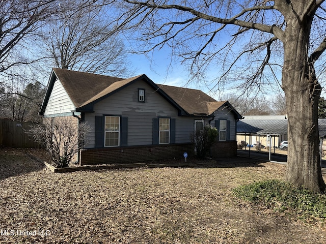 view of front of house with a carport