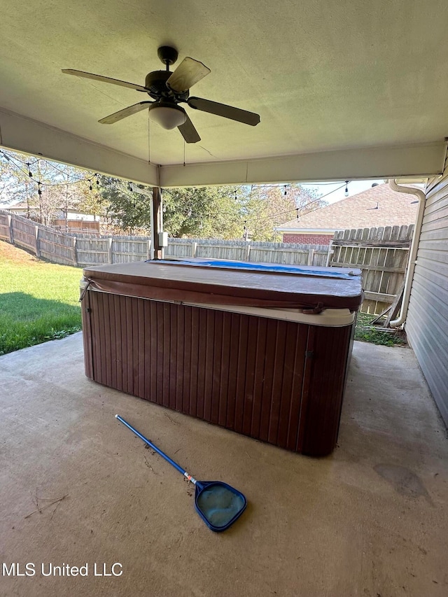 view of patio featuring ceiling fan