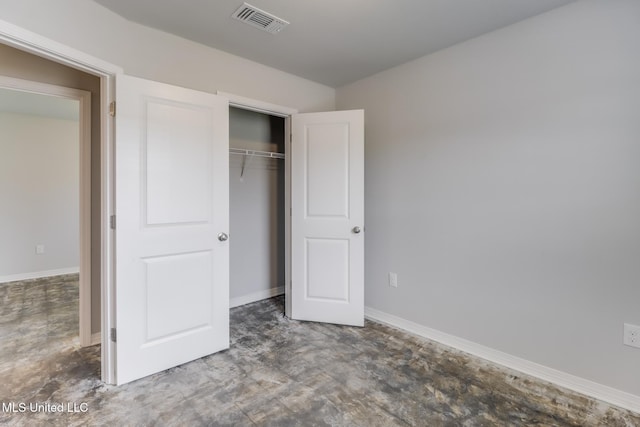 14840 Audubon Lake Blvd, Gulfport, MS 39503 - unfurnished bedroom with baseboards and a closet