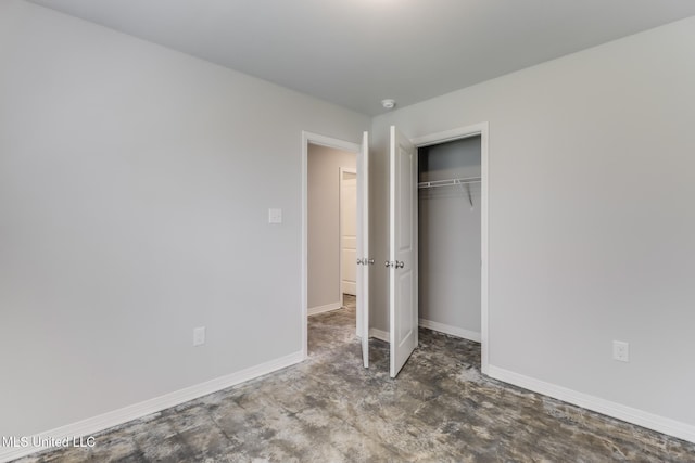14840 Audubon Lake Blvd, Gulfport, MS 39503 - unfurnished bedroom with baseboards and a closet