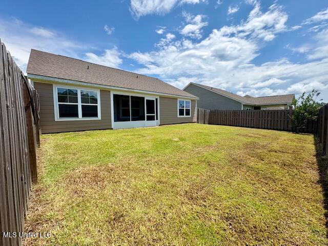 14840 Audubon Lake Blvd, Gulfport, MS 39503 - back of house with a fenced backyard