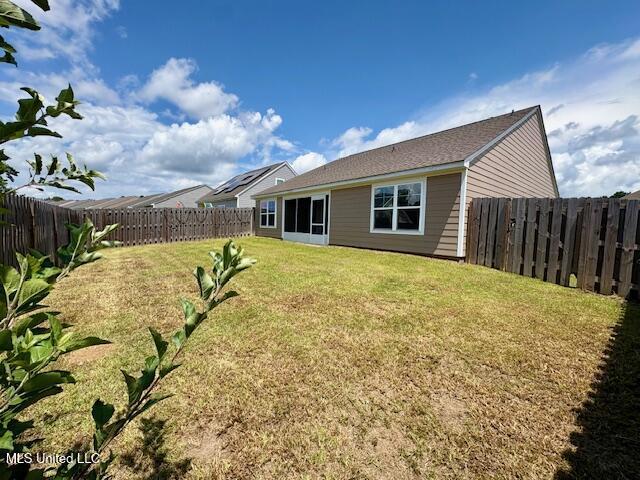14840 Audubon Lake Blvd, Gulfport, MS 39503 - back of house featuring a fenced backyard