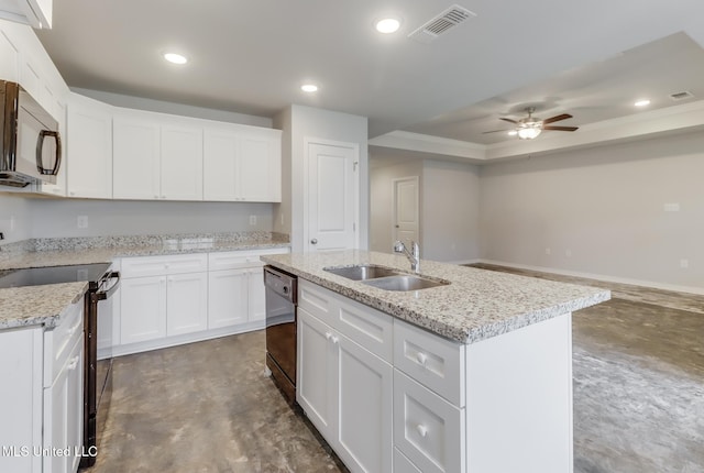 14840 Audubon Lake Blvd, Gulfport, MS 39503 - kitchen with black appliances, concrete floors, a ceiling fan, recessed lighting, and white cabinets