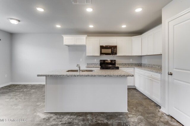 14840 Audubon Lake Blvd, Gulfport, MS 39503 - kitchen featuring black appliances, finished concrete flooring, white cabinets, light stone countertops, and recessed lighting