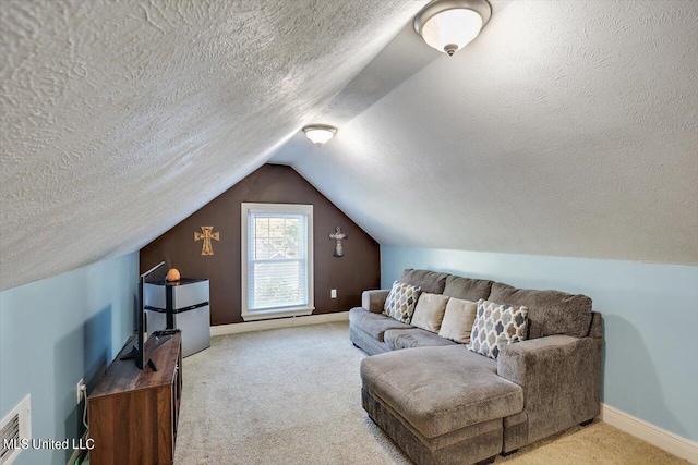 carpeted living room featuring lofted ceiling and a textured ceiling