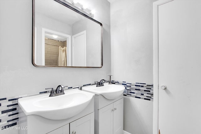 15820 Big Ridge Rd, Biloxi, MS 39532 - full bathroom with two vanities and backsplash