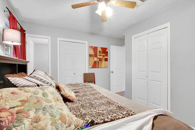15820 Big Ridge Rd, Biloxi, MS 39532 - bedroom featuring multiple closets and ceiling fan