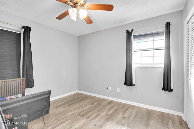 15820 Big Ridge Rd, Biloxi, MS 39532 - empty room featuring wood finished floors, a ceiling fan, and baseboards