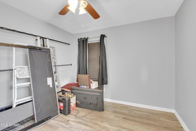 15820 Big Ridge Rd, Biloxi, MS 39532 - misc room with wood finished floors, ceiling fan, and baseboards