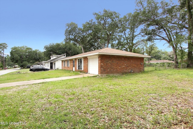 15820 Big Ridge Rd, Biloxi, MS 39532 - view of side of home with a garage and brick siding