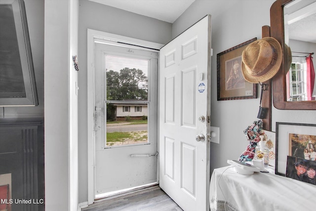 15820 Big Ridge Rd, Biloxi, MS 39532 - doorway featuring wood finished floors and baseboards
