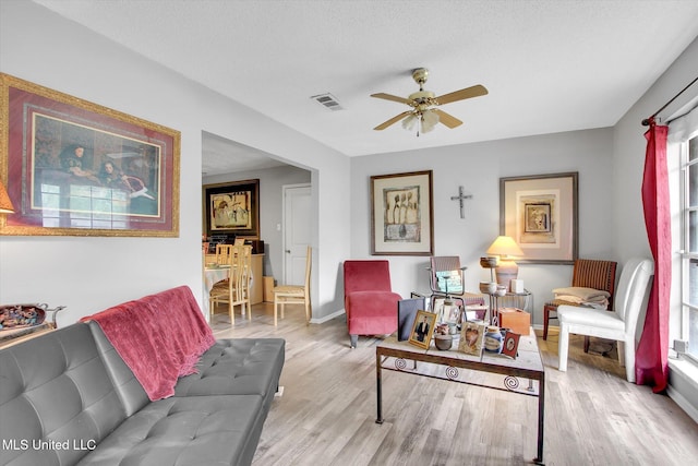 15820 Big Ridge Rd, Biloxi, MS 39532 - living room with ceiling fan, wood finished floors, and baseboards