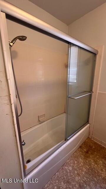 full bath with enclosed tub / shower combo