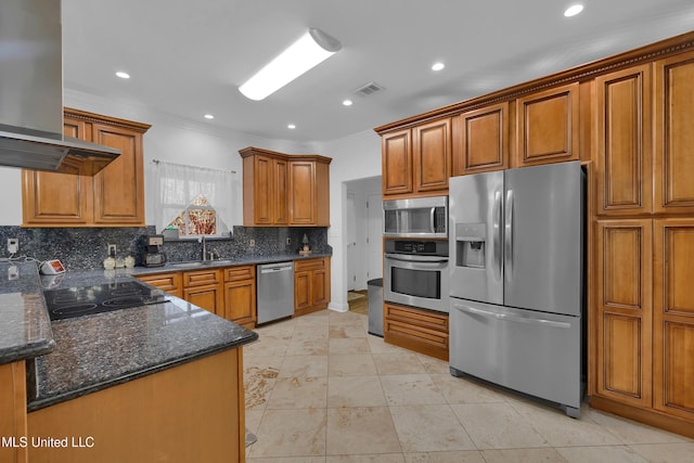 kitchen featuring island exhaust hood, decorative backsplash, stainless steel appliances, and sink