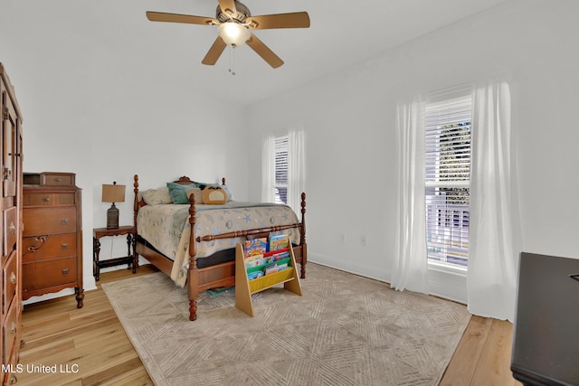 bedroom featuring ceiling fan and light wood-type flooring