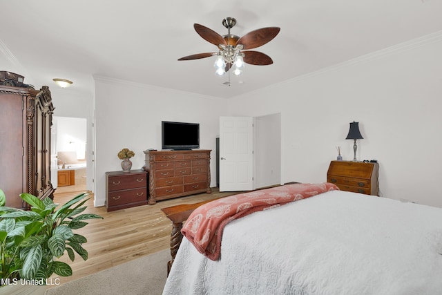 bedroom with ensuite bath, ceiling fan, crown molding, and light wood-type flooring