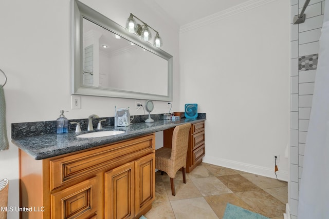 bathroom with vanity and ornamental molding