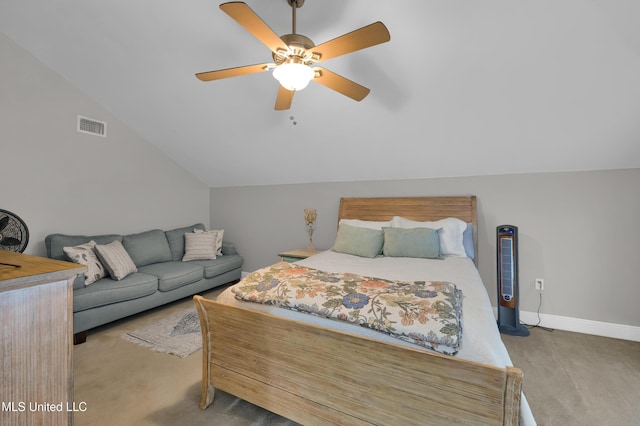 bedroom featuring light carpet, vaulted ceiling, and ceiling fan