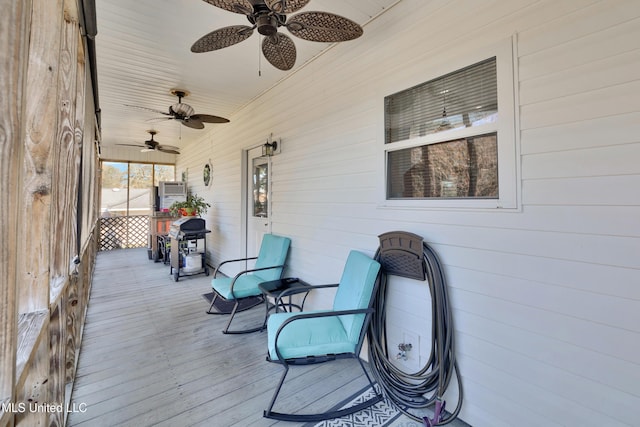 wooden deck featuring covered porch