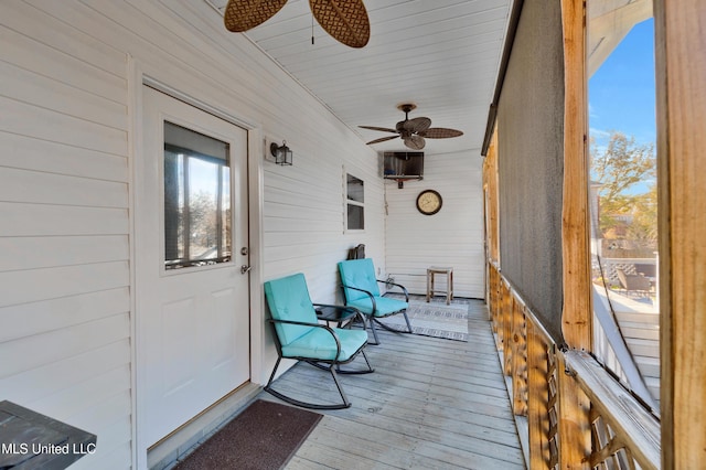 sunroom / solarium with ceiling fan