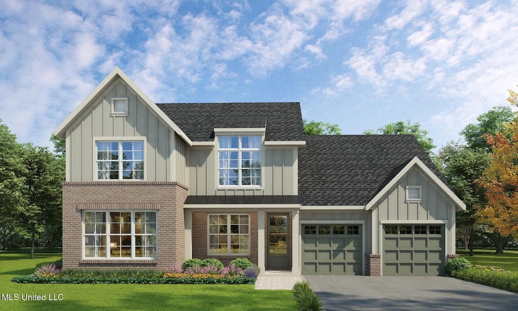 view of front of property with board and batten siding, a garage, and brick siding