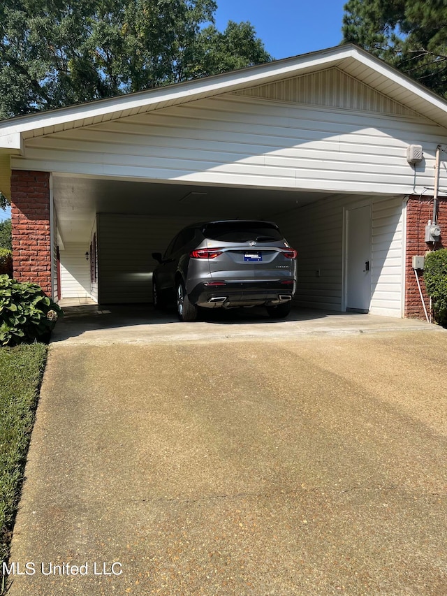 exterior space featuring a carport