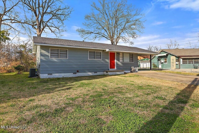 ranch-style house featuring central air condition unit, driveway, crawl space, a carport, and a front lawn