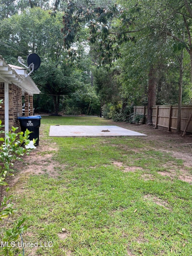 view of yard with fence