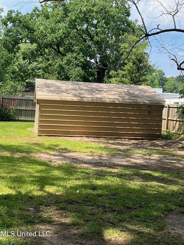 view of outdoor structure with fence