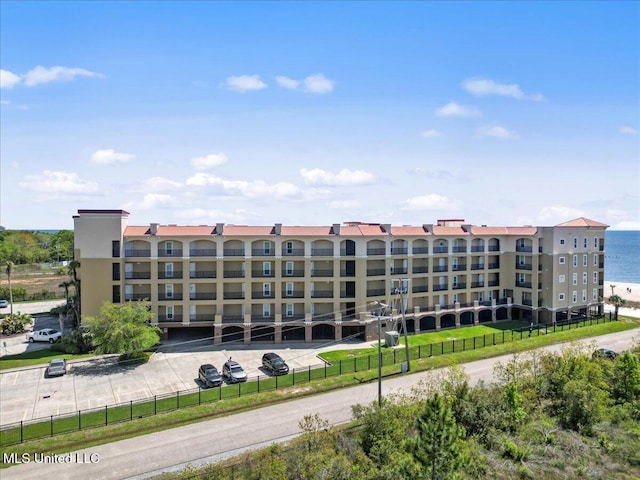 view of property with a water view