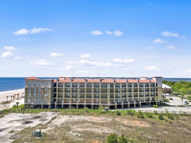 view of building exterior featuring a water view