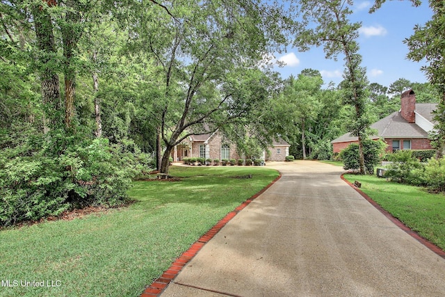 7622 Fairway Dr, Diamondhead, MS 39525 - view of front facade featuring a front yard
