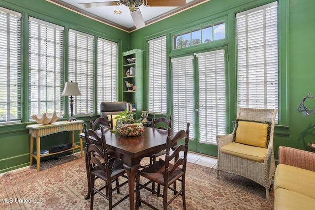 1616 Poplar Blvd, Jackson, MS 39202 - dining space with a ceiling fan, crown molding, and tile patterned floors