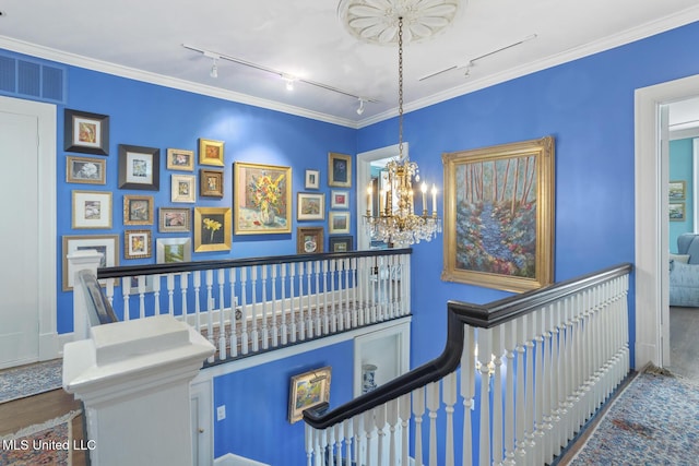 1616 Poplar Blvd, Jackson, MS 39202 - stairway with rail lighting and a chandelier